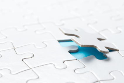 #267396360 von © kenishiotie, Hand placing the last jigsaw puzzle piece or holding missing jigsaw puzzle piece down in to the place von Kenishirotie